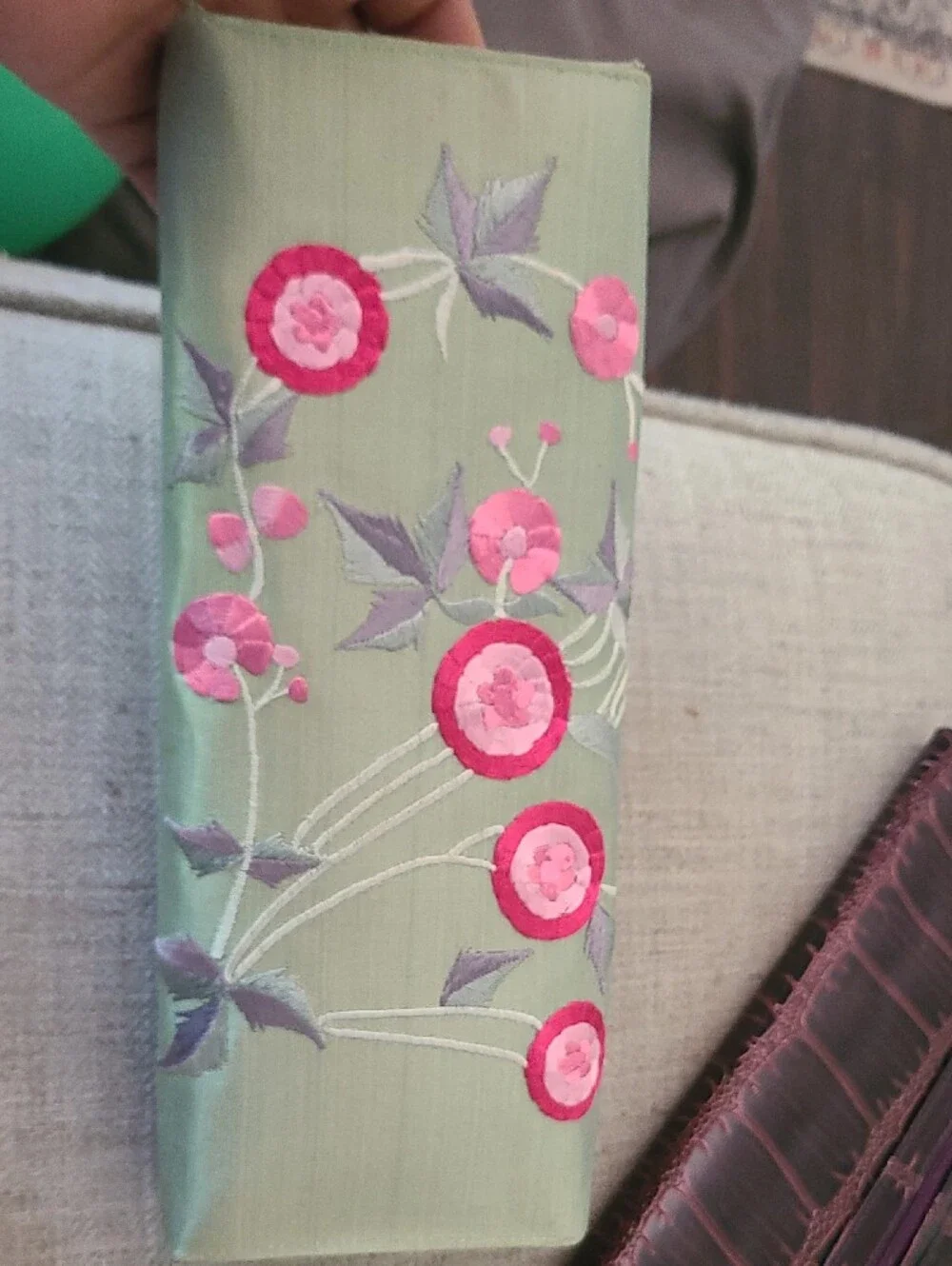 Hand-Embroidered Green Wall Hanging with Pink Floral Accents